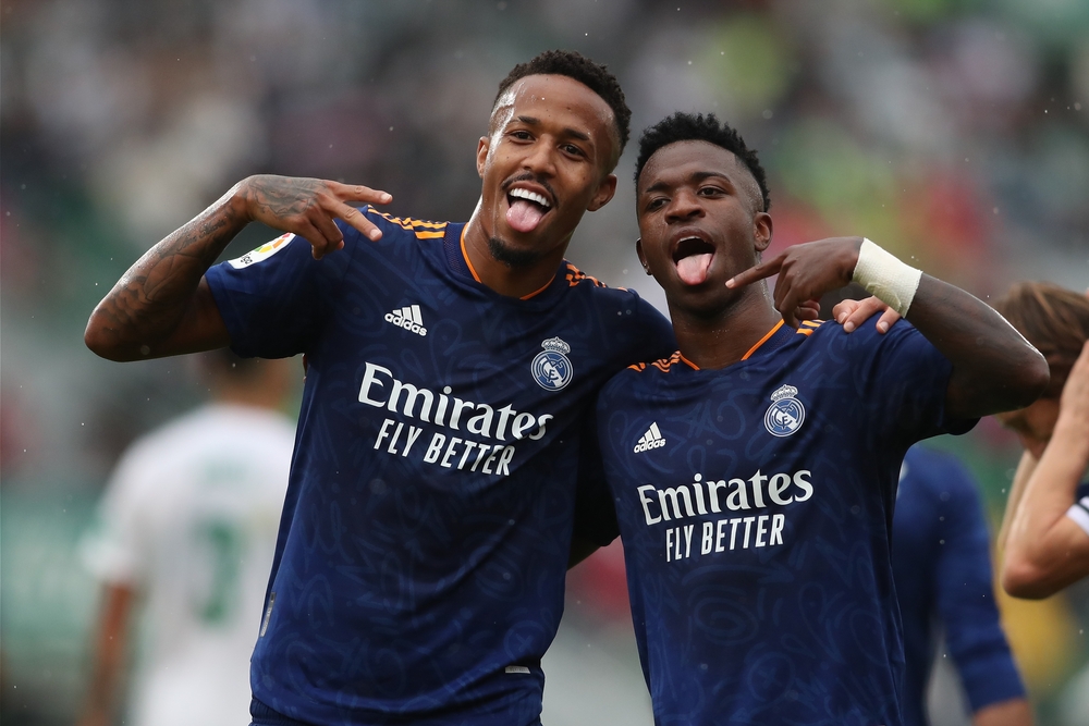 Eder Militao and Vinicius Jr.